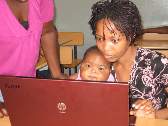 Learning to use a computer in Inhambane, Mozambique
